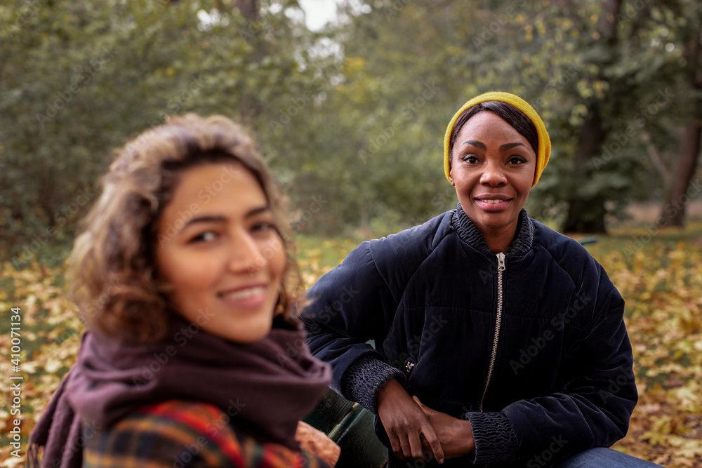 Smiling women looking at camera Smiling women looking at camera