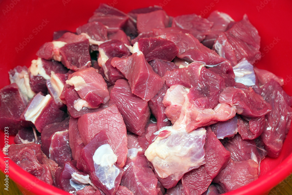 Raw beef meat cut into pieces