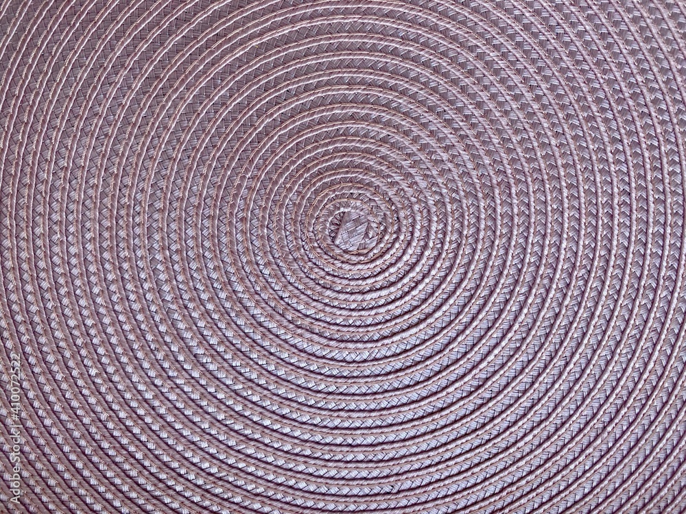 pink round braided pattern. close up of textile napkin pink round braided pattern. close up of textile napkin
