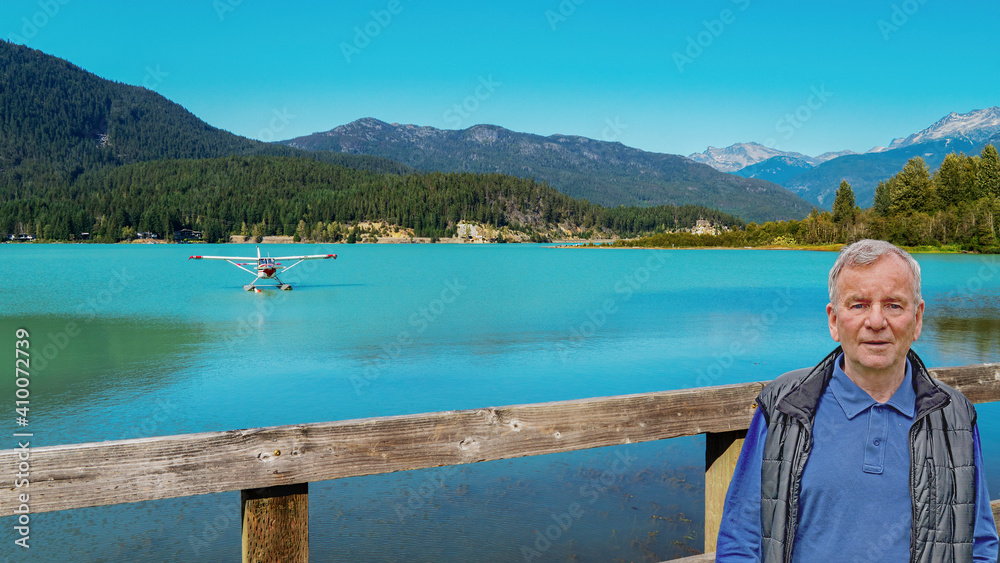 Senior enjoying a walk on Valley Trail, Whistler, BC, at Green Lake.