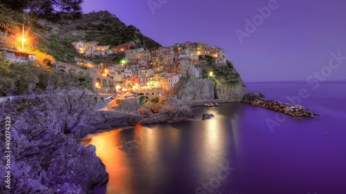 Light of Cinque Terre reflectin gin the ocean photo