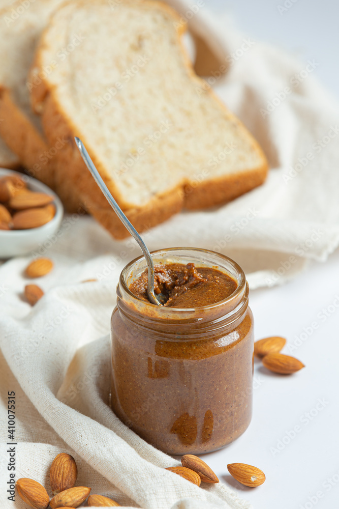Raw Organic Almond Butter on white background Raw Organic Almond Butter on white background