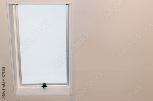 White Tinted Window in a White Wall