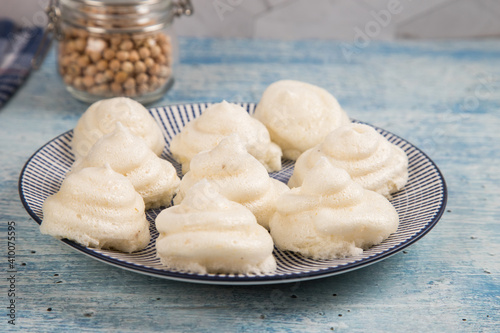 Close-up of a ready-made homemade marshmallow from Aquafaba on a plate. Whipped chickpea broth is an excellent ingredient for confectionery products based on vegetable protein