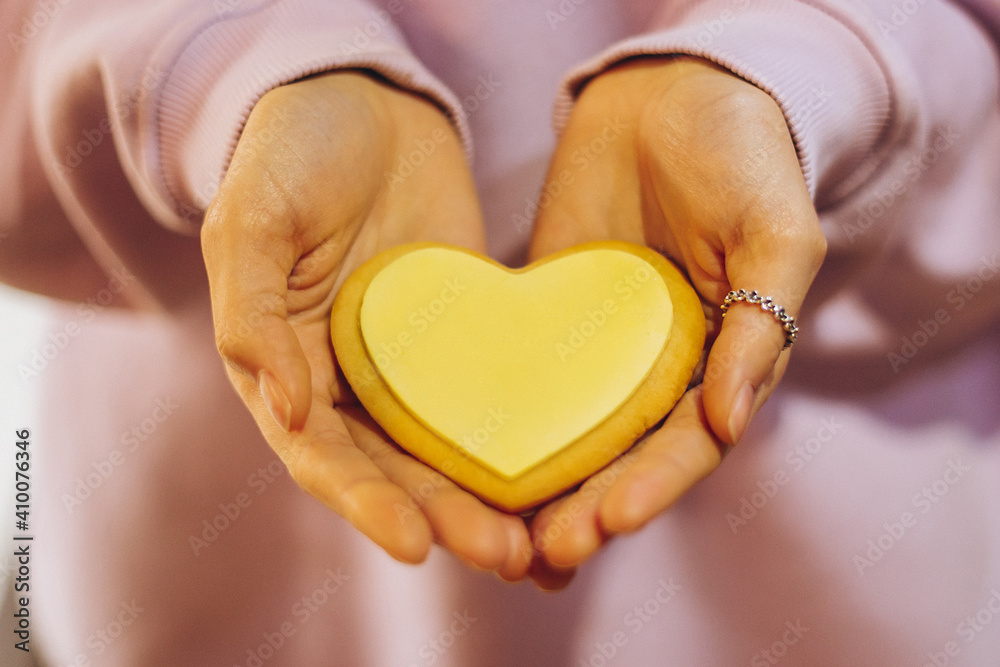 Obraz premium cute heart-shaped cookies with colored glaze prepared for Valentine's Day
