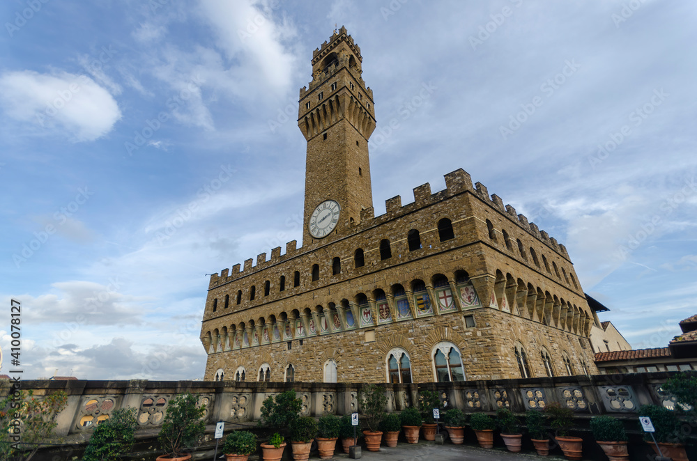 Florence, Italy. Facade of Old Palace Palazzo Vecchio - marble historic architecture. Famous sightseeing in the city.