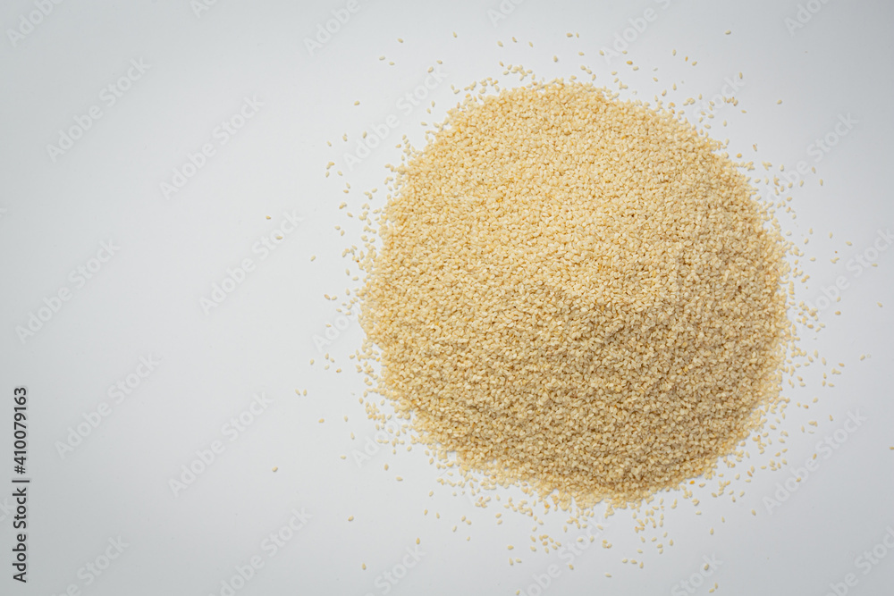 Sesame seeds on marble background Sesame seeds on marble background