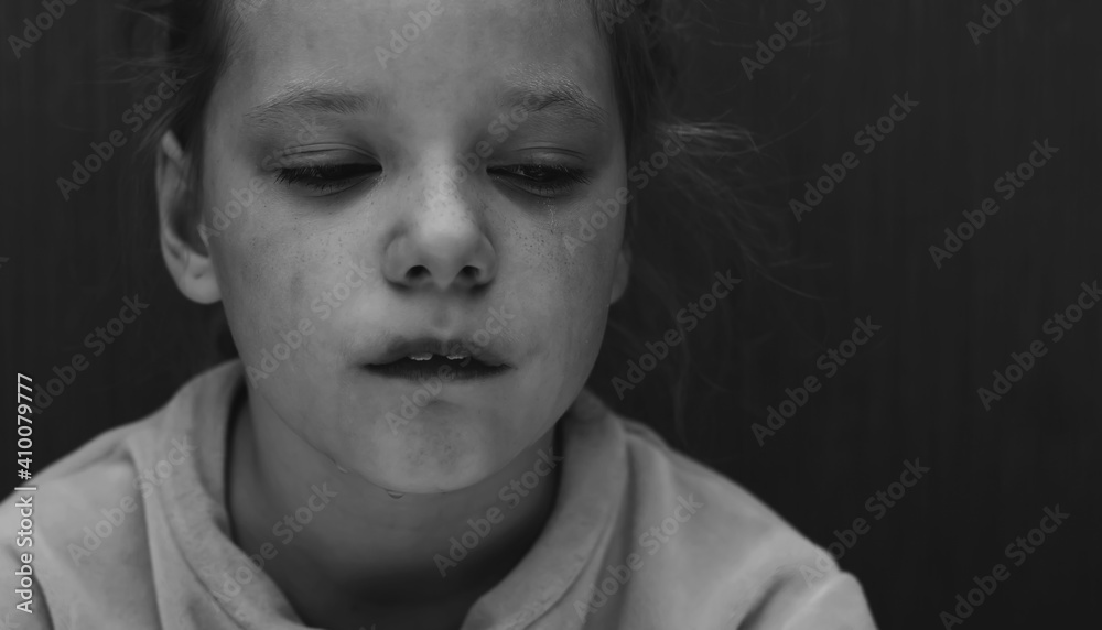 Crying and upset kid girl in black and white Crying and upset kid girl in black and white
