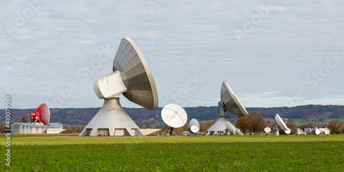 Side view on several satellite dishes. Pointing towards the sky. Raisting Radome. photo