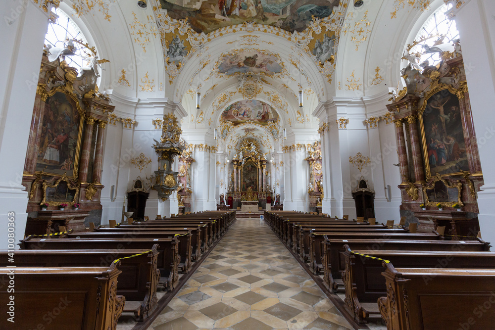 View along the main aisle of the church of Schäftlarn Abbey towards the altar. Interior of a typical upper bavarian church.