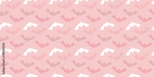 Halloween bat seamless repeat pattern pink background.