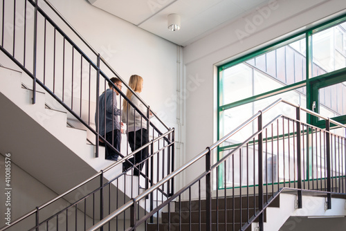 Coworkers on staircase