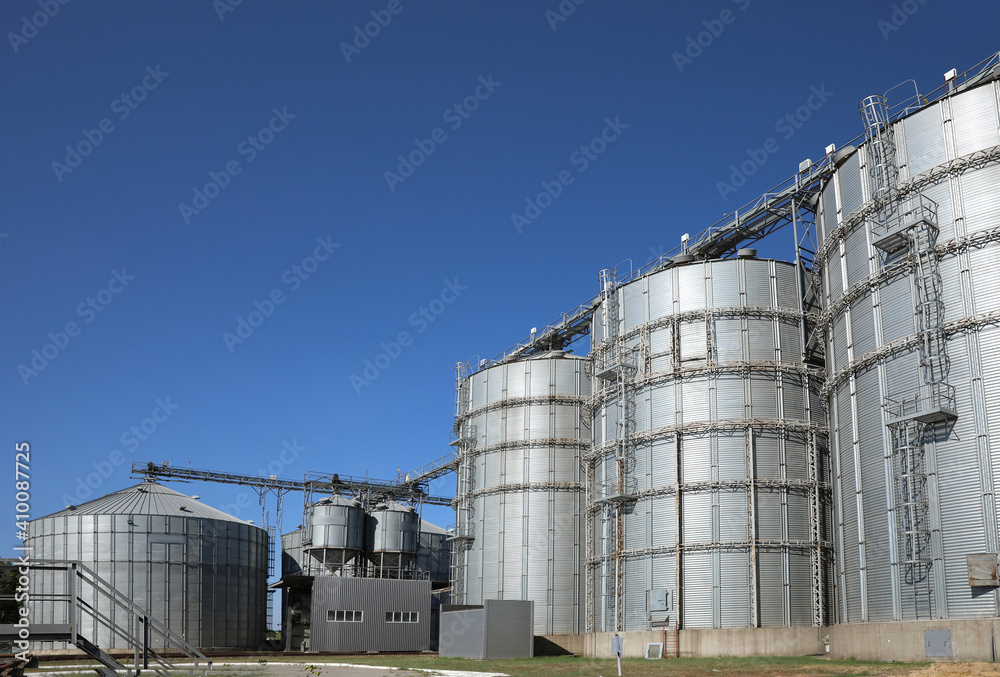 View of modern granaries for storing cereal grains outdoors View of modern granaries for storing cereal grains outdoors