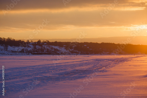 Winter sunset in the field. 