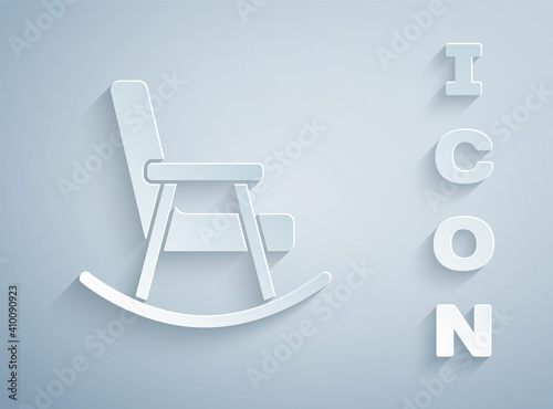 Paper cut Rocking chair icon isolated on grey background. Paper art style. Vector.