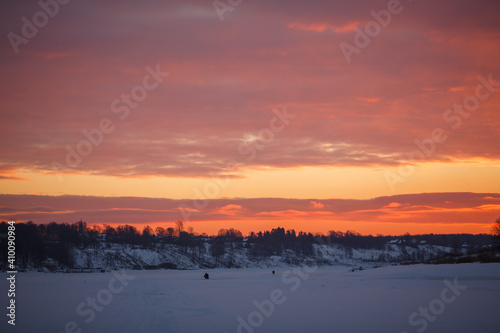 Winter sunset in the field. 