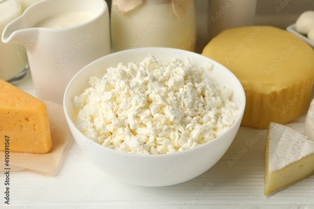 Different fresh dairy products on white wooden table Different fresh dairy products on white wooden table