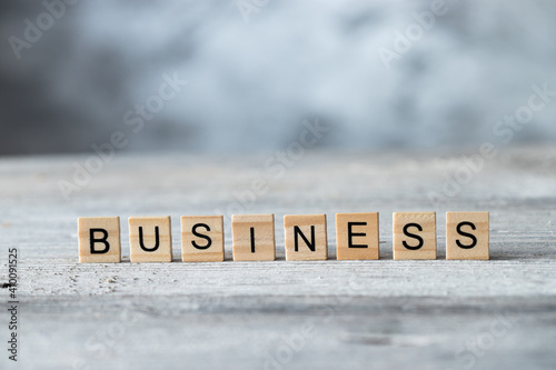 Business word on grey background