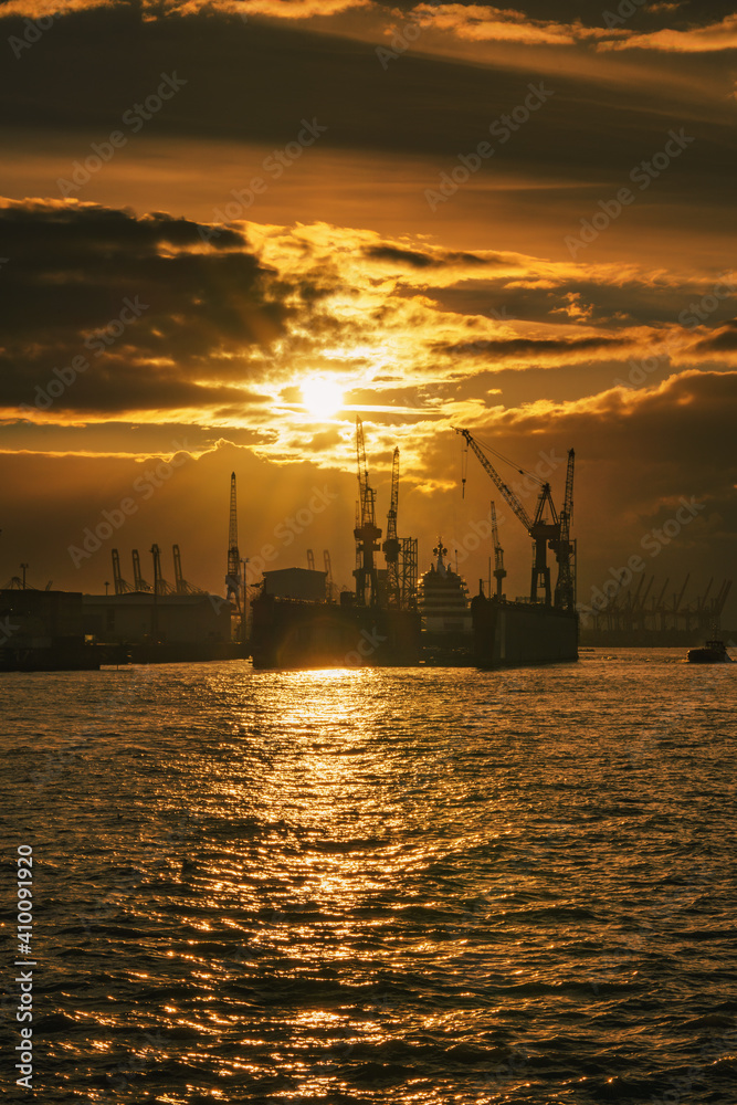 Hamburg, Germany - haffen at sunset with dramatic sky