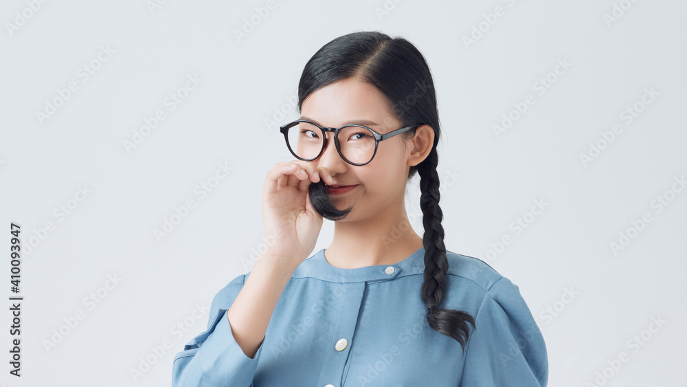Young cheerful girl having fun. Smiling Woman with bright makeup and hairstyle with pigtails on white background Young cheerful girl having fun. Smiling Woman with bright makeup and hairstyle with pigtails on white background