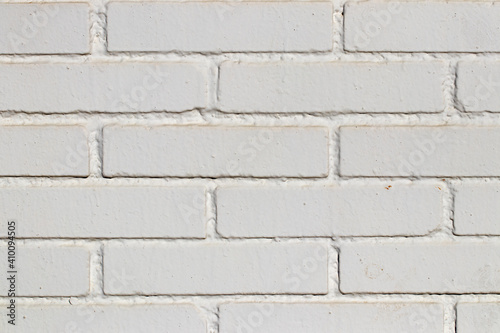 Stone texture background. Closeup of a old grunge white of a weathered brick wall texture. Abstract background concept, retro layout, interior design and wall banner. Macro photograph.