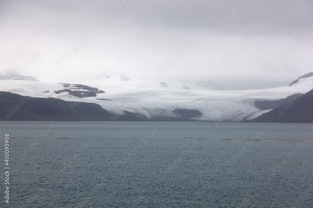 South Georgia landscape with sea on a cloudy winter day 