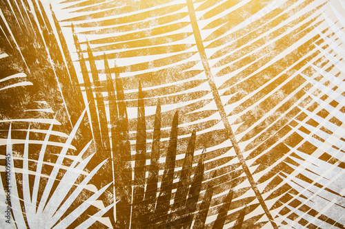 Gray and yellow. Tropical leaves on a divided abstract background.