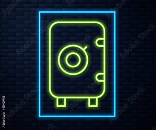 Glowing neon line Safe icon isolated on brick wall background. The door safe a bank vault with a combination lock. Reliable Data Protection. Vector.