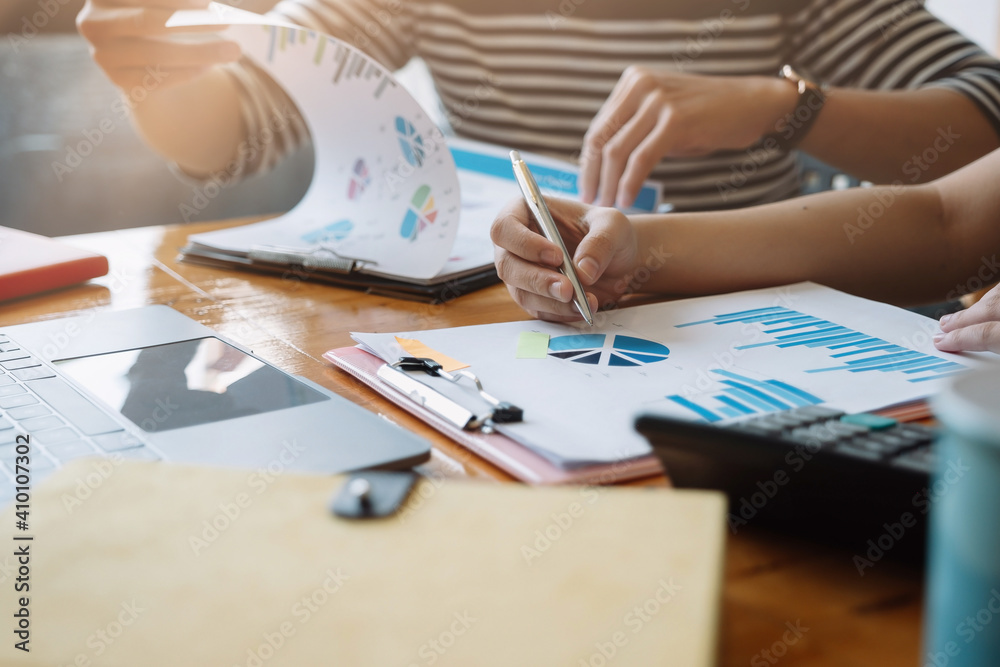 Business people are meeting for analysis data figures to plan business strategies. Business discussing concept. Business people are meeting for analysis data figures to plan business strategies. Business discussing concept.