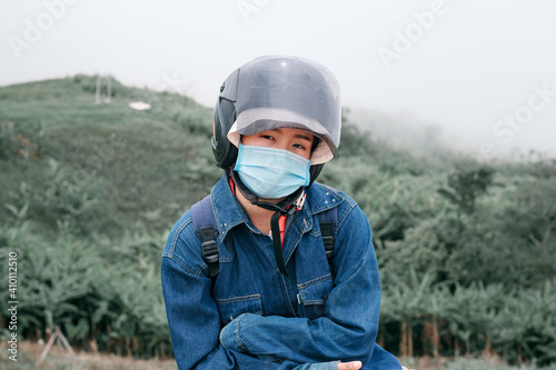 person in protective helmet © สุรีย์ฉาย เกษรมาลา