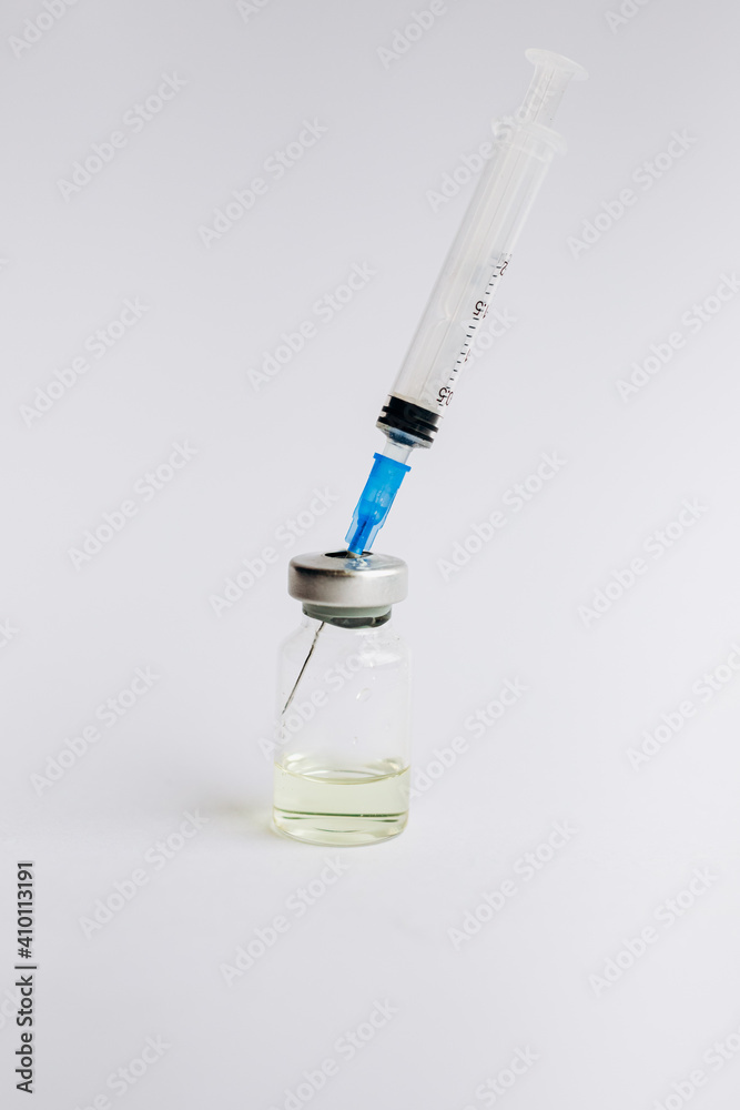 Vaccine. Syringe and ampoule with a vaccine. Coronavirus. Vaccination. Covid-19. Vaccine. Syringe and ampoule with a vaccine. Coronavirus. Vaccination. Covid-19.