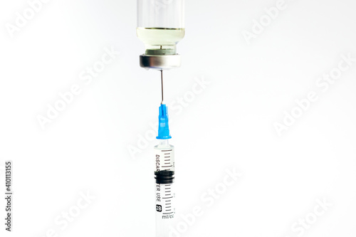Vaccine. Syringe and ampoule with a vaccine. Coronavirus. Vaccination. Covid-19.