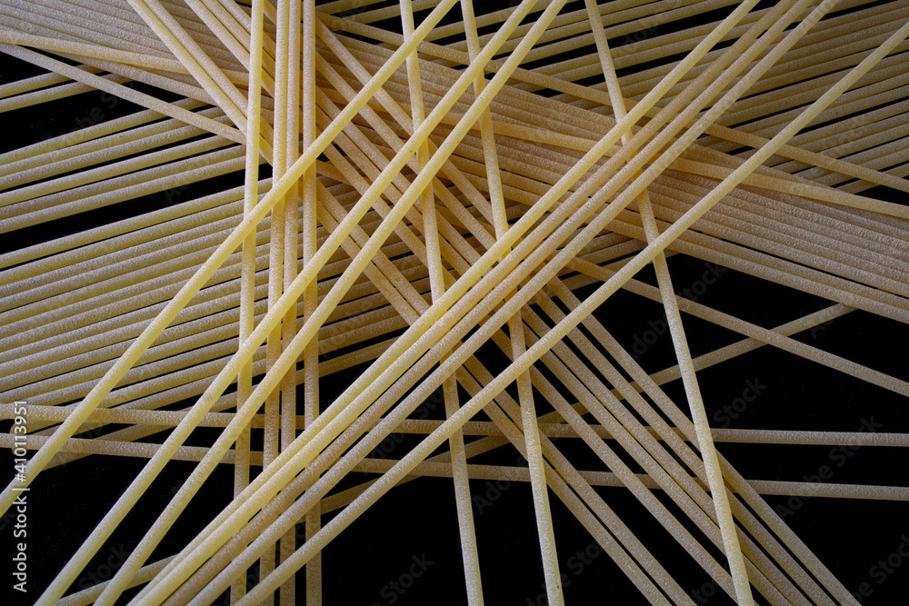 italian spaghetti on a black background italian spaghetti on a black background