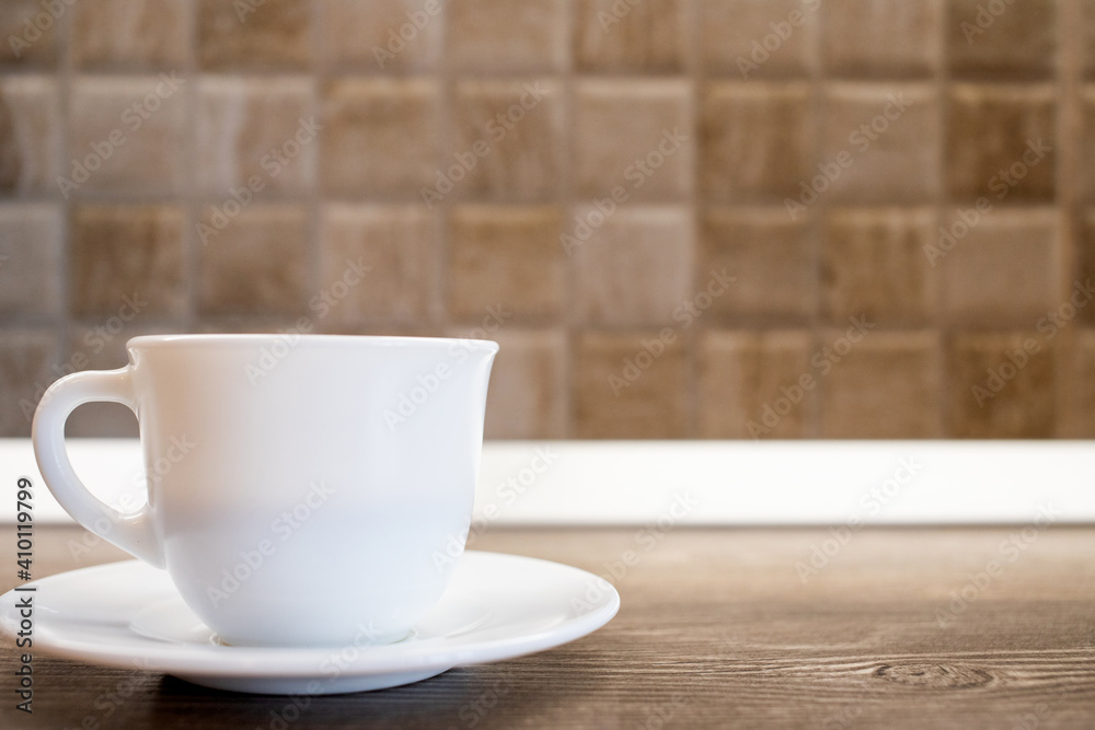 Fototapeta premium cup of coffee on wooden background