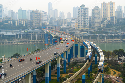 Light rail runs on bridges at high speed in Chongqing, China #410119722