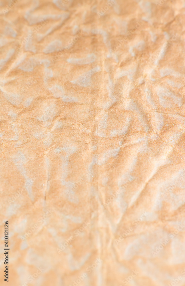 Rumpled beige background. Real texture of the wrapping texture. Gold background. Rumpled beige background. Real texture of the wrapping texture. Gold background.