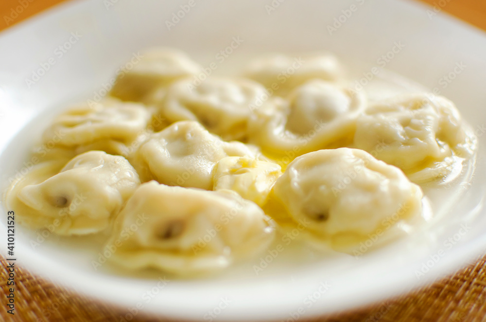 Bowl with tasty dumplings. Traditional Ukrainian cuisine.