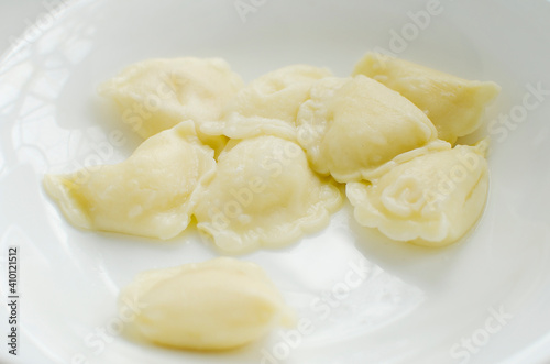 Dumplings with potatoes, close-up. Traditional Russian dish - dumplings