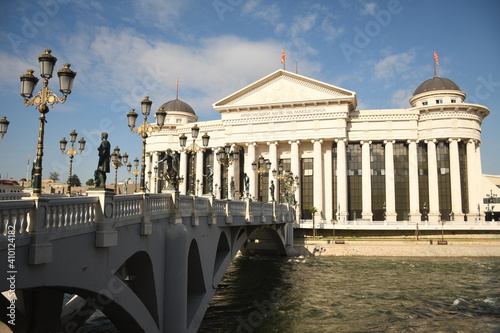 The Eye bridge over the Vardar river to white building of the archeological museum of Macedonia in Slopje city.