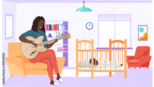 Woman playing and singing. Mom singing lullaby to baby at night and helps him to sleep. Musician creates music. Mother playing guitar. Family rest together at home. Guitarist composes songs