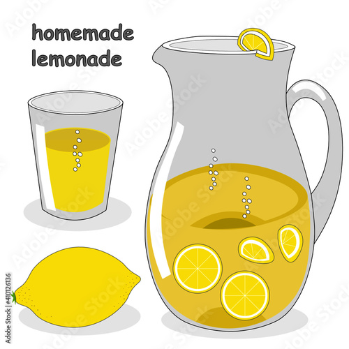 Fresh homemade lemonade with lemon slices in large glass jug. Glass and lemon are nearby.
