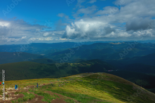 Mountains landscapes hiking trails wilderness forest fields and flowers farm car road haystacks Carpathians