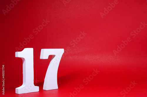 No. 17 ( Seventeen ) Isolated red  Background with Copy Space - Number 17% Percentage or Promotion - Discount or anniversary concept                            photo