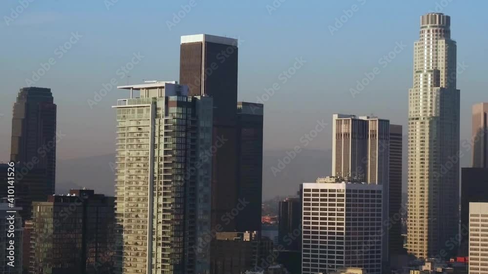 Aerial descending view of skyscrapers in Downtown, Los Angeles, California, USA, at the end of the day slowly descending - Drone shot Aerial descending view of skyscrapers in Downtown, Los Angeles, California, USA, at the end of the day slowly descending - Drone shot