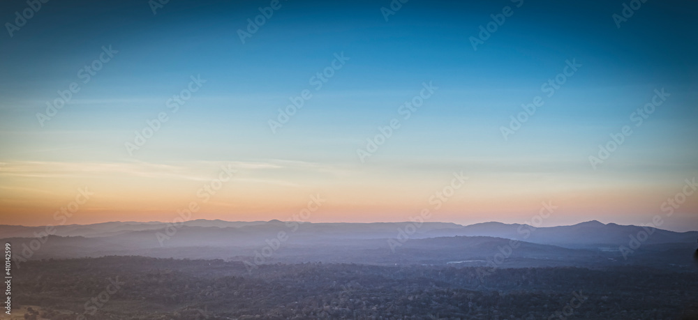 Panorama of a beautiful landscape with mountain ranges at sunset.  At Khao Yai National Park Thailand