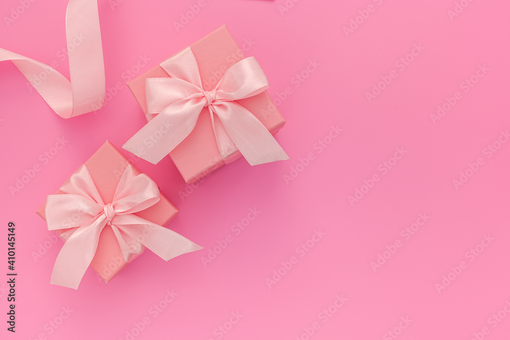 Composition of pink two gift boxes with ribbon and hearts Composition of pink two gift boxes with ribbon and hearts