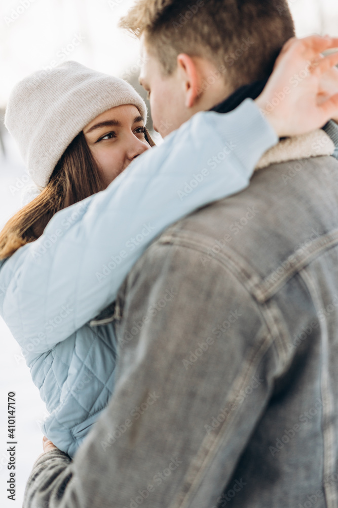 A couple walks in the winter. Couple in love. Snow. Winter. A couple walks in the winter. Couple in love. Snow. Winter.