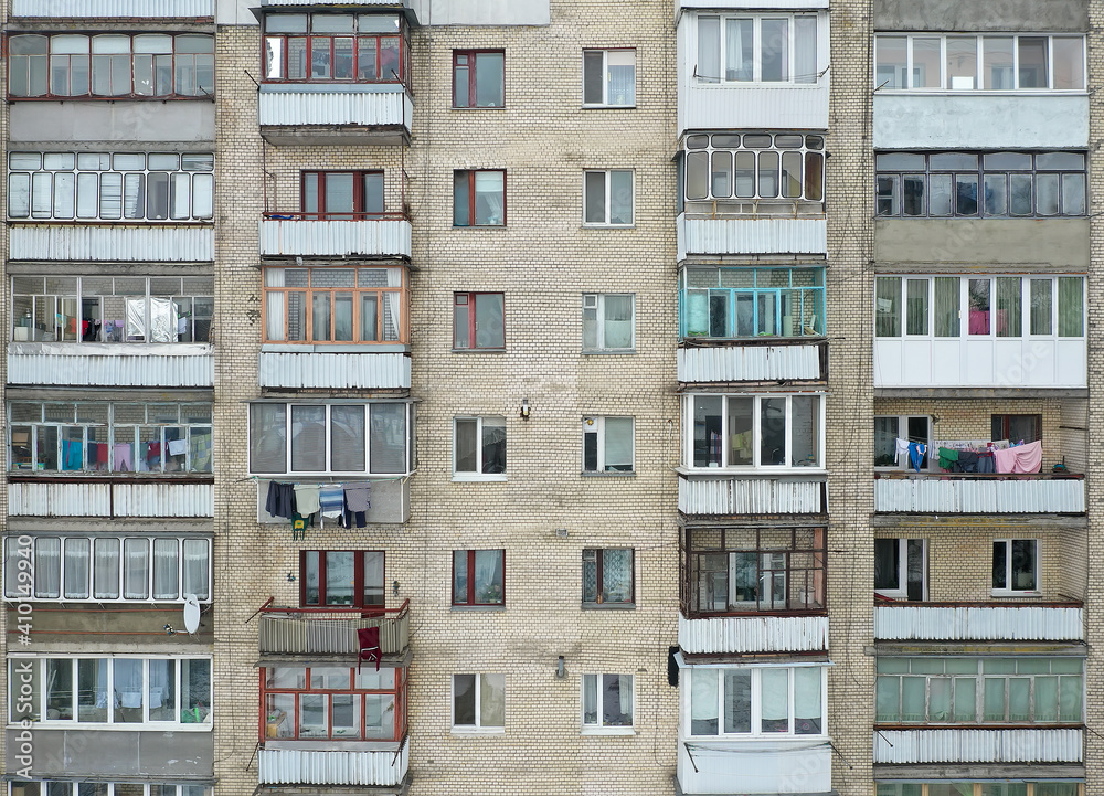 Facade of the panel building. Typical houses in the post-Soviet countries Facade of the panel building. Typical houses in the post-Soviet countries