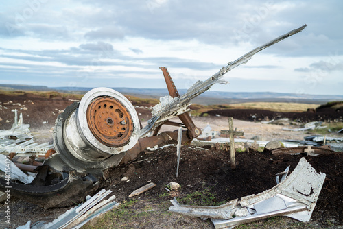 Abandoned B29 WW2 American AS Airforce Bomber Overexposed crash site on Bleaklow Moor with rusty aircraft engine parts and aeroplane landing gear wheels wreckage strewn across Peak District landscape  photo