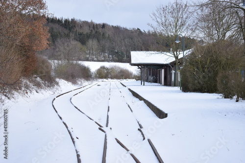 einsamer alter Bahnhof Engeln im Schnee photo